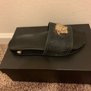 Authentic Versace Slides can fit US 9